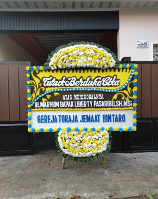 Papan Bunga Duka di Parindu